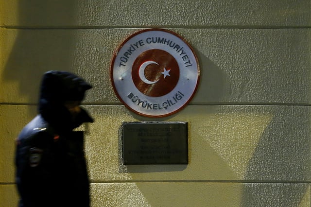 A policeman stands guard in front of the Turkish embassy during a protest in reaction after a Russian war plane was shot down by Turkey, in Moscow, Russia, November 24, 2015.  REUTERS/Maxim Shemetov/File Photo