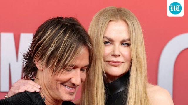 Keith Urban changed song lyrics inspired by Nicole Kidman to honor his guitarist amid divorce.