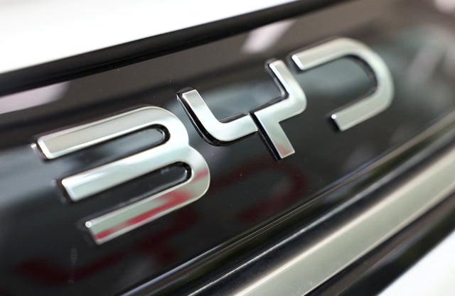 A BYD logo is displayed on a car at a dealership in Sant Cugat del Valles, near Barcelona, Spain, September 12, 2025. REUTERS/ Albert Gea/File Photo