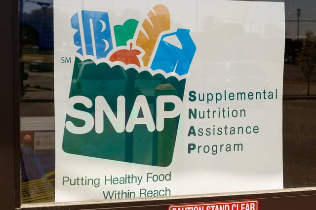 Stock image/file photo: SNAP accepted here sign in a retailer window.