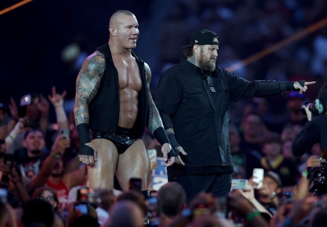 EAST RUTHERFORD, NEW JERSEY - AUGUST 02: Randy Orton and Jelly Roll make their entrance before a tag team match against Logan Paul and Drew McIntyre during the WWE 2025 SummerSlam at MetLife Stadium on August 02, 2025 in East Rutherford, New Jersey.