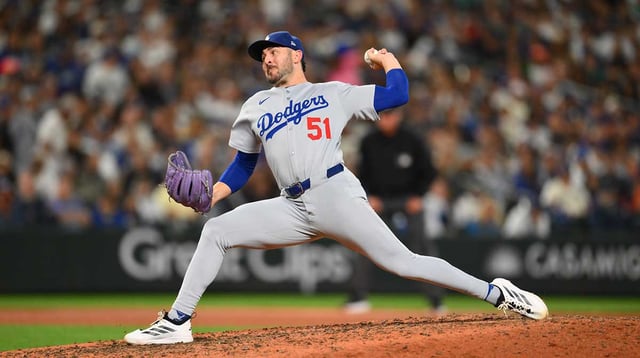 Sep 27, 2025; Seattle, Washington, USA; Los Angeles Dodgers relief pitcher Alex Vesia (51) pitches to the Seattle Mariners during the eighth inning at T-Mobile Park. Mandatory Credit: Steven Bisig-Imagn Images