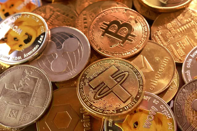 Representation of cryptocurrencies are seen in this illustration taken September 10, 2025. REUTERS/Dado Ruvic/Illustration/File Photo