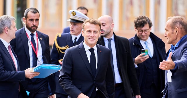 France's President Emmanuel Macron arrives for a summit at the Danish Parliament at Christiansborg Castle in Copenhagen, Denmark. Reuters