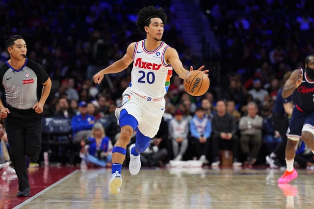 Nov 24, 2024; Philadelphia, Pennsylvania, USA; Philadelphia 76ers guard Jared McCain (20) controls the ball against the Los Angeles Clippers in the second quarter at Wells Fargo Center. Mandatory Credit: Kyle Ross-Imagn Images