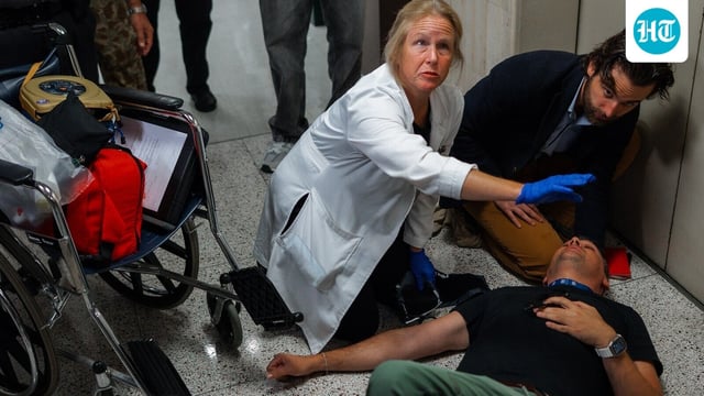 A photojournalist was hospitalized after being shoved to the ground by masked federal agents in NYC. 