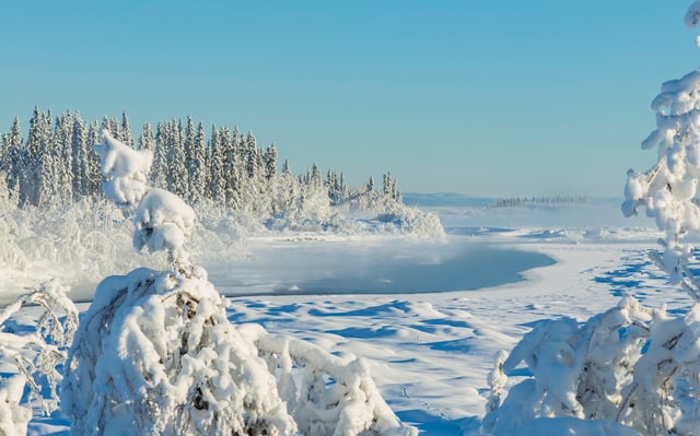A stock image shows the frozen Alaska wilderness.