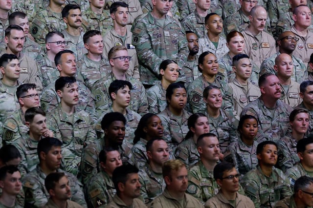 US troops gather to listen President Donald Trump deliver remarks at Al Udeid Air Base in Doha, Qatar, on May 15.