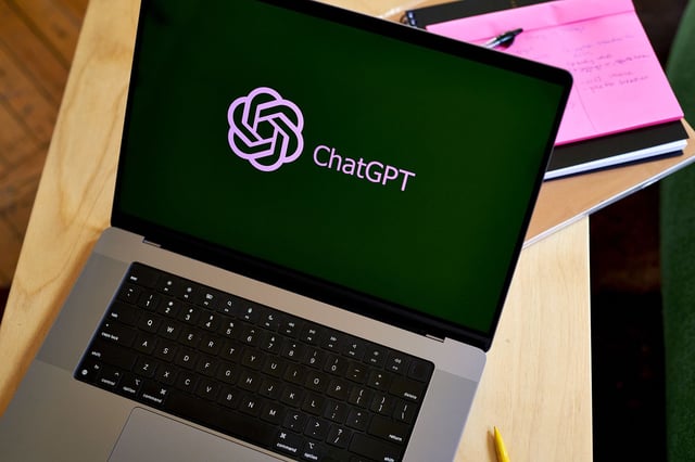 The ChatGPT logo on a laptop computer arranged in the Brooklyn borough of New York, US, on Thursday, March 9, 2023. ChatGPT has made writing computer code and cheating on homework easier. Soon, it could make email scams a cinch. That's the warning from Darktrace Plc, the British cybersecurity firm. Photographer: Gabby Jones/Bloomberg via Getty Images