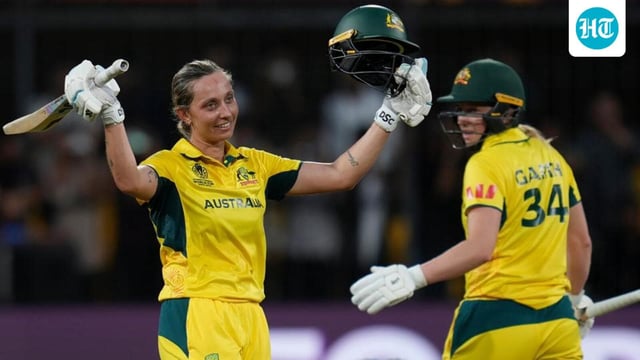 Australia's Ashleigh Gardner celebrates her century in the ICC Women's Cricket World Cup match against New Zealand at the Holkar Cricket Stadium in Indore on Wednesday. (AP)