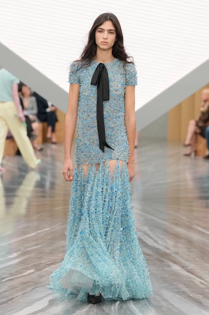 Jonathan Anderson's tenure at Loewe peeked through in the diaphanous, high-neck blouses and ruffled peony mule heels. (Plus, some appealing leather bags.) 