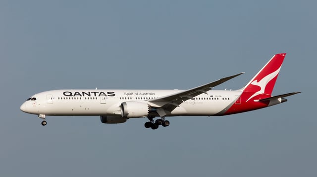 Qantas has apologized after screening an R-rated Dakota Johnson movie to a full flight of unwitting passengers.