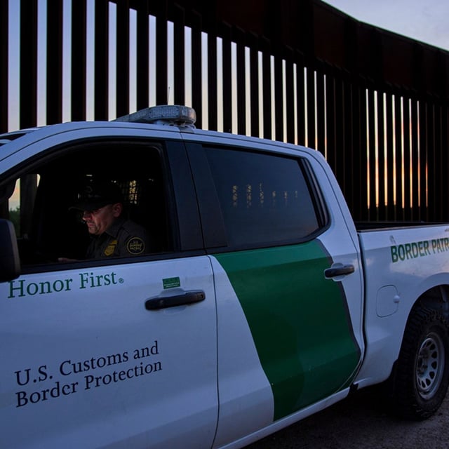 A border patrol agent works by a section of the border wall, Wednesday, June 18, 2025, in Mission, Texas. (AP Photo/Jacquelyn Martin)