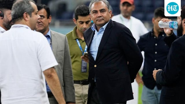 Asian Cricket Council president, Mohsin Naqvi, also the Pakistan interior minister, stands with officials after the India-Pakistan Asia Cup final in Dubai on Sunday. (AP)