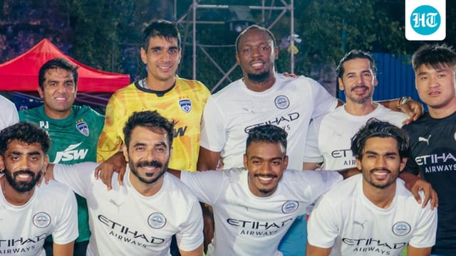 Jamaican sprint legend Usain Bolt poses after an exhibition football game in Mumbai on Wednesday. (HT Photo)