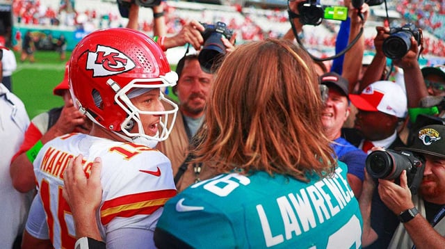 Kansas City Chiefs quarterback Patrick Mahomes (15) says goodbye to Jacksonville Jaguars quarterback Trevor Lawrence (16) after a NFL football game Sunday, Sept. 17, 2023 at EverBank Stadium in Jacksonville, Fla. The Kansas City Chiefs defeated the Jacksonville Jaguars 17-9. [Corey Perrine/Florida Times-Union]