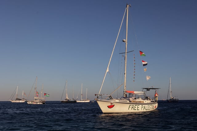 Sailing boats, part of the Global Sumud Flotilla aiming to reach Gaza and break Israel's naval blockade, sail off  Koufonisi islet, Greece, September 26, 2025. REUTERS/Stefanos Rapanis/File Photo