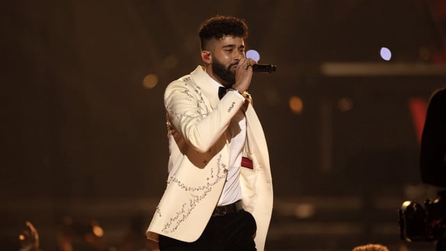 AP Dhillon performs at the Juno Awards in Edmonton in 2023. A man convicted of shooting Dhillon's Colwood, B.C., home has been sentenced to time in jail. 