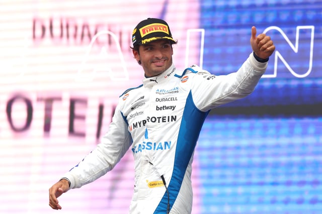 BAKU, AZERBAIJAN - SEPTEMBER 21: Third placed Carlos Sainz of Spain and Williams gives a thumbs up on the podium during the F1 Grand Prix of Azerbaijan at Baku City Circuit on September 21, 2025 in Baku, Azerbaijan. (Photo by Peter Fox/Getty Images)