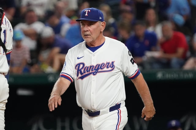 Sep 23, 2025; Arlington, Texas, USA; Texas Rangers manager Bruce Bochy (15) walks to the mound for a pitching change during the fourth inning against the Minnesota Twins at Globe Life Field. Mandatory Credit: Raymond Carlin III-Imagn Images/ File Photo
