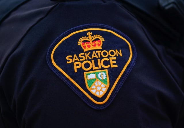 A Saskatoon Police Service badged is stitched onto an officers’ uniform n Saskatoon, Sask., on Friday, May 5, 2023. THE CANADIAN PRESS/Heywood Yu