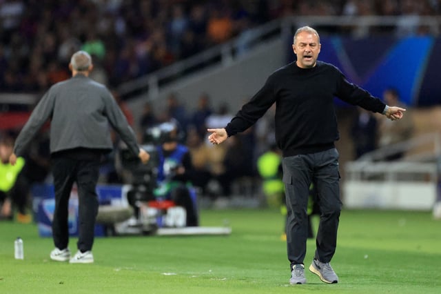 Soccer Football - UEFA Champions League - FC Barcelona v Paris St Germain - Estadi Olimpic Lluis Companys, Barcelona, Spain - October 1, 2025 FC Barcelona coach Hansi Flick reacts REUTERS/Nacho Doce