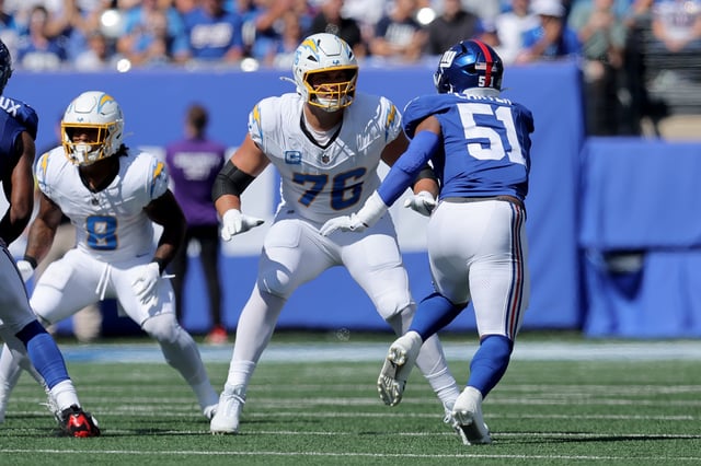 Sep 28, 2025; East Rutherford, New Jersey, USA; Los Angeles Chargers offensive tackle Joe Alt (76) blocks against New York Giants linebacker Abdul Carter (51) during the first quarter at MetLife Stadium. Mandatory Credit: Brad Penner-Imagn Images/ File Photo