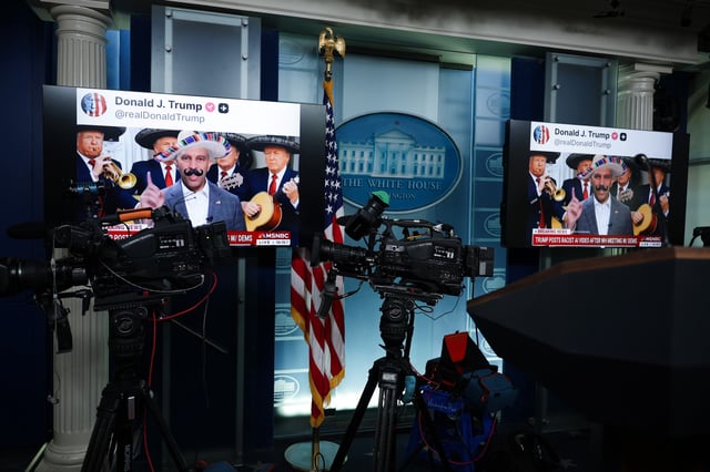 WASHINGTON, DC - OCTOBER 01: Screens display AI-modified videos of House Minority Leader Hakeem Jeffries (D-NY) and U.S. Senate Minority Leader Chuck Schumer (D-NY) that were shared on social media by President Donald Trump in the Brady Press Briefing Room at the White House on October 01, 2025 in Washington, DC.  Vice President JD Vance dismissed criticism of the posts in today's daily press briefing, adding, "I'll tell Hakeem Jeffries right now, I make this solemn promise to you, that if you help us reopen the government, the sombrero memes will stop." (Photo by Alex Wong/Getty Images)