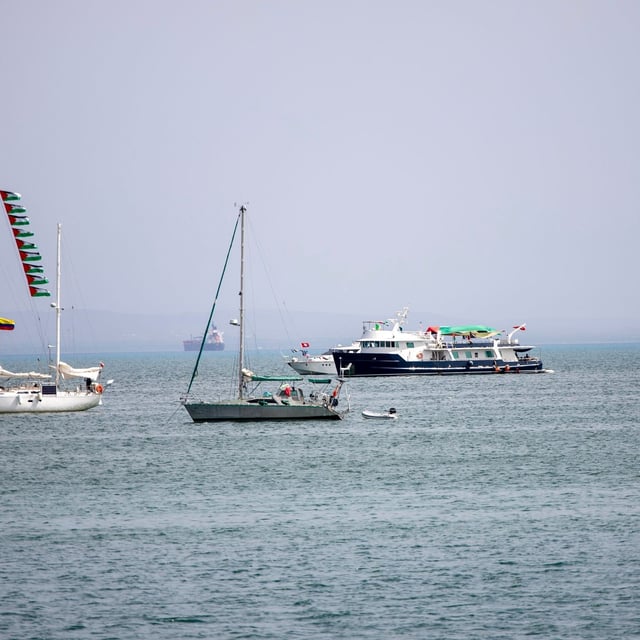 Ships that are part of the Global Sumud Flotilla heading to Gaza are anchored off the coast of of Sidi Bou Saïd in Tunis, Tunisia, Tuesday, Sept. 9, 2025. (AP Photo/Anis Mili)