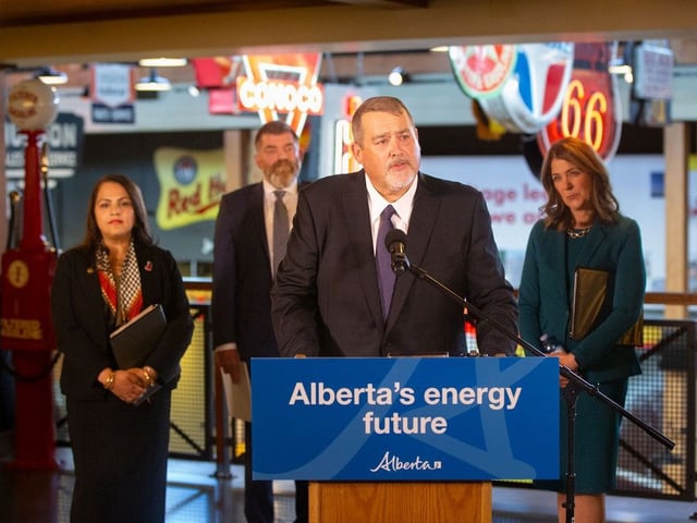  Alex Pourbaix, executive chair of Cenovus Energy, speaks while accompanied by Alberta Premier Danielle Smith, Minister of Energy and Minerals Brian Jean, and Minister of Indigenous Relations Rajan Sawhney at a press conference in Calgary on Wednesday, Oct. 1, 2025.