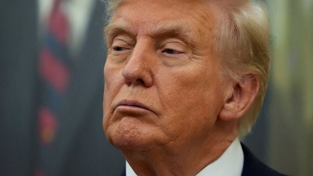 US President Donald Trump looks on, on the day he announces a deal with Pfizer to sell drugs at lower prices.
