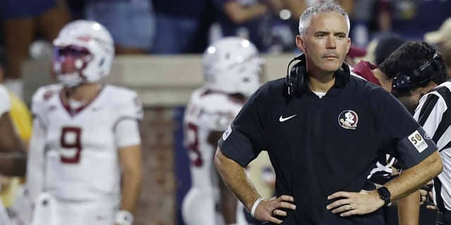 Sep 26, 2025; Charlottesville, Virginia, USA; Florida State Seminoles head coach Mike Norvell looks on during a stoppage in play against the Virginia Cavaliers at Scott Stadium. Mandatory Credit: Geoff Burke-Imagn Images