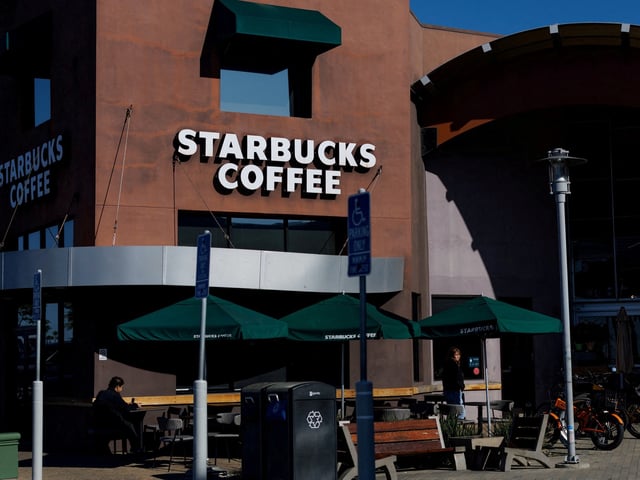 FILE PHOTO: A Starbucks store is shown in Encinitas, California, U.S., February 24, 2025.   REUTERS/Mike Blake/File Photo