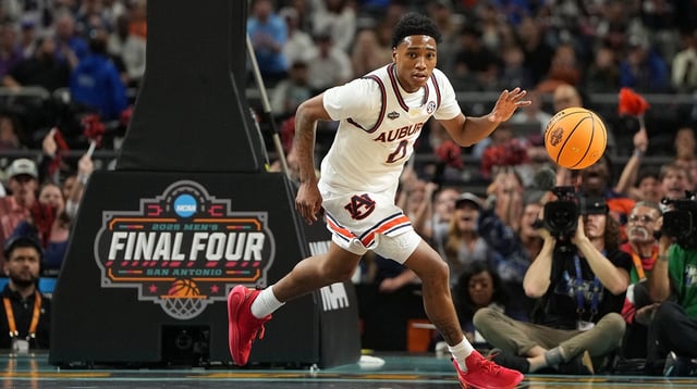 Apr 5, 2025; San Antonio, TX, USA; Auburn Tigers guard Tahaad Pettiford (0) drives to the basket against the Florida Gators during the first half in the semifinals of the men's Final Four of the 2025 NCAA Tournament at the Alamodome. Mandatory Credit: Bob Donnan-Imagn Images