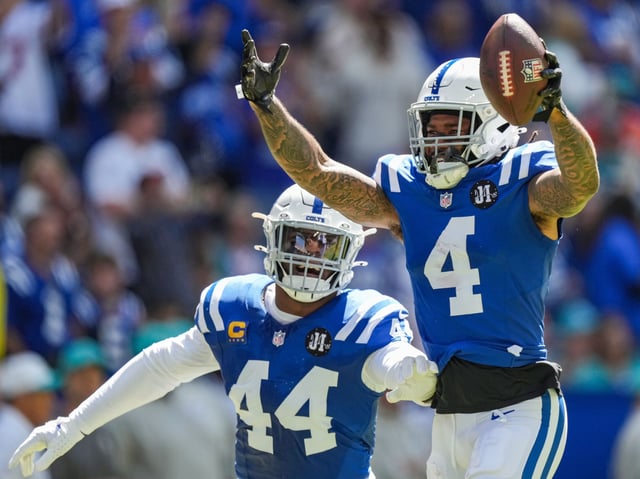 Sep 7, 2025; Indianapolis, Indiana, USA; Indianapolis Colts cornerback Xavien Howard (4) celebrates a turnover against the Miami Dolphins  at Lucas Oil Stadium. Mandatory Credit: Grace Hollars-USA TODAY Network via Imagn Images