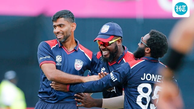USA's Saurabh Netravalkar and teammates celebrate the dismissal of India's Virat Kohli during their Group A match