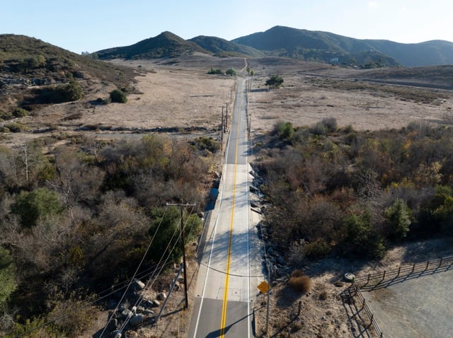 The two-lane road in and out of Harmony Grove South. (Nelvin C. Cepeda / The San Diego Union-Tribune)