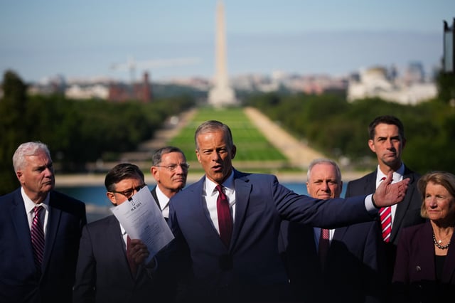 WASHINGTON, DC - OCTOBER 01: Senate Majority Leader John Thune (R-SD) (C) leads a news conference with (L-R) House Majority Whip Tom Emmer (R-MN), Speaker of the House Mike Johnson (R-LA), Senate Majority Whip John Barrasso (R-WY), House Majority Leader Steve Scalise (R-LA), U.S. Sen. Tom Cotton (R-AR) and U.S. Sen. Shelley Moore Capito (R-WV) on the Upper West Terrace of U.S. Capitol Building on October 1, 2025 in Washington, DC. The government shut down early Wednesday after Congress failed to reach a funding deal. (Photo by Andrew Harnik/Getty Images)