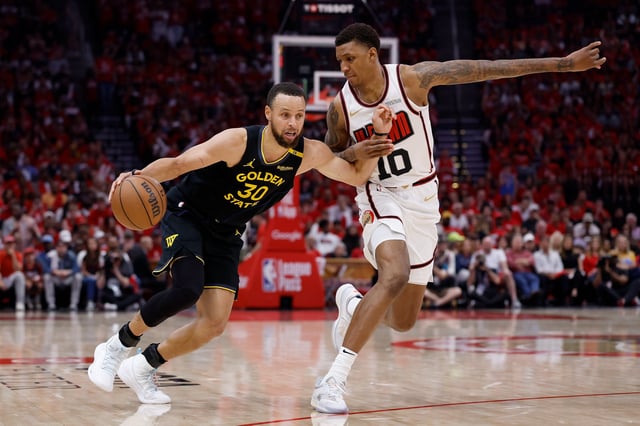 HOUSTON, TEXAS - MAY 04: Stephen Curry #30 of the Golden State Warriors drives to the basket against Jabari Smith Jr. #10 of the Houston Rockets in the second half in Game Seven of the Western Conference First Round NBA Playoffs at Toyota Center on May 04, 2025 in Houston, Texas.  NOTE TO USER: User expressly acknowledges and agrees that, by downloading and or using this photograph, User is consenting to the terms and conditions of the Getty Images License Agreement. (Photo by Tim Warner/Getty Images)