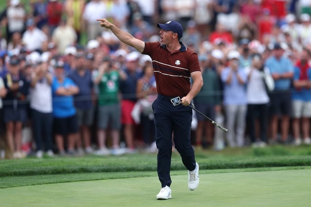 FARMINGDALE, NEW YORK - SEPTEMBER 27: Rory McIlroy of Team Europe yells to the crowd as he walks off the 17th hole green during the Saturday afternoon four-balls matches of the 2025 Ryder Cup at Black Course at Bethpage State Park Golf Course on September 27, 2025 in Farmingdale, New York. (Photo by Carl Recine/Getty Images)