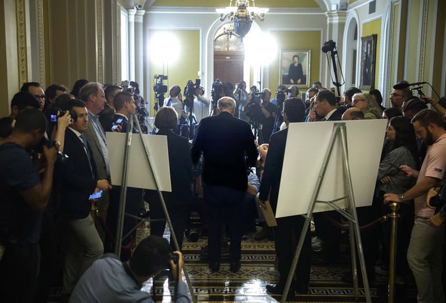 Senate Minority Leader Charles Schumer speaks to media at the US Capitol on Tuesday.
