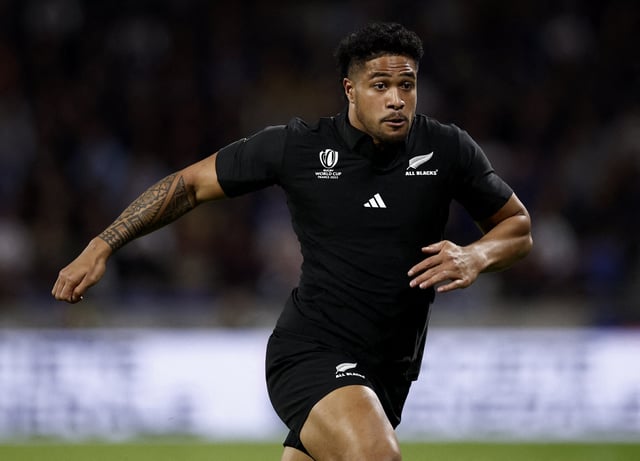 Rugby Union - Rugby World Cup 2023 - Pool A - New Zealand v Uruguay - Groupama Stadium, Lyon, France - October 5, 2023 New Zealand's Leicester Fainga'anuku in action REUTERS/Benoit Tessier