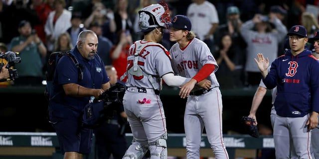Sep 9, 2025; West Sacramento, California, USA; Boston Red Sox starting pitcher Connelly Early (71) hugs with catcher Carlos Narvaez (75) after the game against the Athletics at Sutter Health Park. Mandatory Credit: Sergio Estrada-Imagn Images.