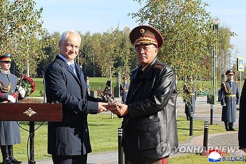 This image published by the Korean Central News Agency on Oct. 2, 2025, shows North Korean Defense Minister No Kwang-chol (R) and Andrei Beloussov, Russia's defense minister, during a ceremony in Russia on Oct. 1. (For Use Only in the Republic of Korea. No Redistribution) (Yonhap)