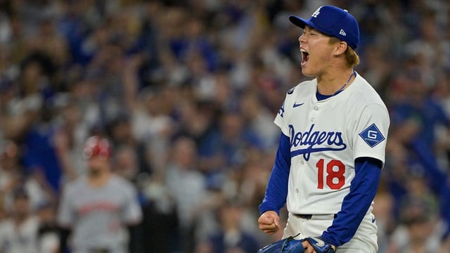 Oct 1, 2025; Los Angeles, California, USA; Los Angeles Dodgers starting pitcher Yoshinobu Yamamoto (18) celebrates after throwing against the Cincinnati Reds in the sixth inning during game two of the Wildcard round for the 2025 MLB playoffs at Dodger Stadium. Mandatory Credit: Jayne Kamin-Oncea-Imagn Images