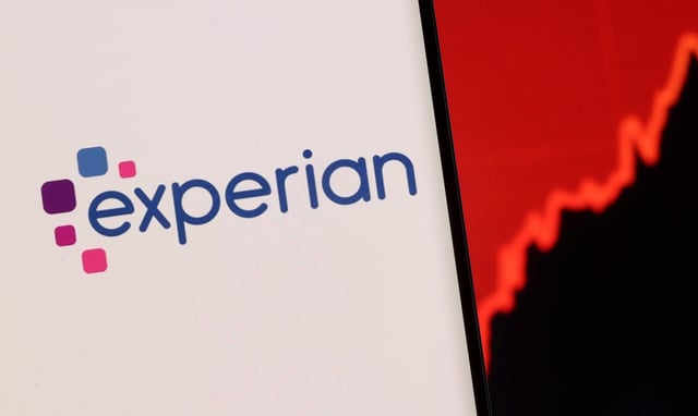 Experian logo is seen on a smartphone in front of displayed stock graph in this illustration taken, December 1, 2021. REUTERS/Dado Ruvic/Illustration