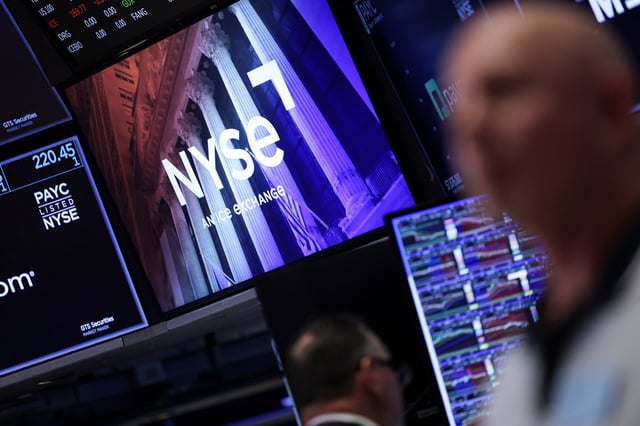 NYSE logo is displayed on a screen at the New York Stock Exchange (NYSE) in New York City, U.S., September 22, 2025. REUTERS/Jeenah Moon
