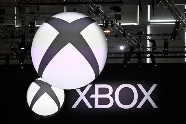 A photo shows the logo of Xbox during the Gamescom video games trade fair at the Trade Fair Center in Cologne, western Germany, on the first day of the fair on August 20, 2025. The 2025 edition of the vast Gamescom trade fair in Cologne, Germany, had its opening night on August 19, 2025 and will be running from August 20 to 24, 2025. (Photo by Ina FASSBENDER / AFP) (Photo by INA FASSBENDER/AFP via Getty Images)