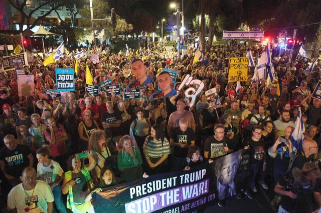 Demonstrators march in Tel Aviv, Israel, on Tuesday, 30 September 2025, calling for the immediate release of all hostages held by Hamas in Gaza and an end to the war. Photo: Ariel Schalit/Associated Press/Alamy