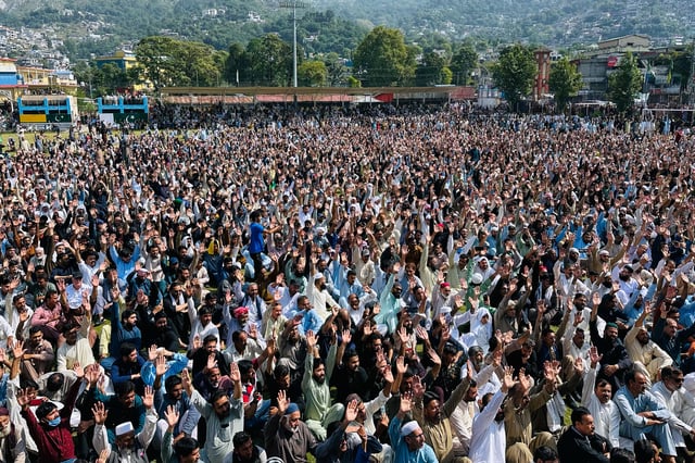 Members of Awami Action Committee chant slogans as they attend the funeral prayers of three victims, who were killed in Wednesday's clashes between police and protestors, in Muzaffarabad, the capital of Pakistani controlled Kashmir, Thursday, Oct. 2, 2025. (AP Photo/M.D. Mughal)